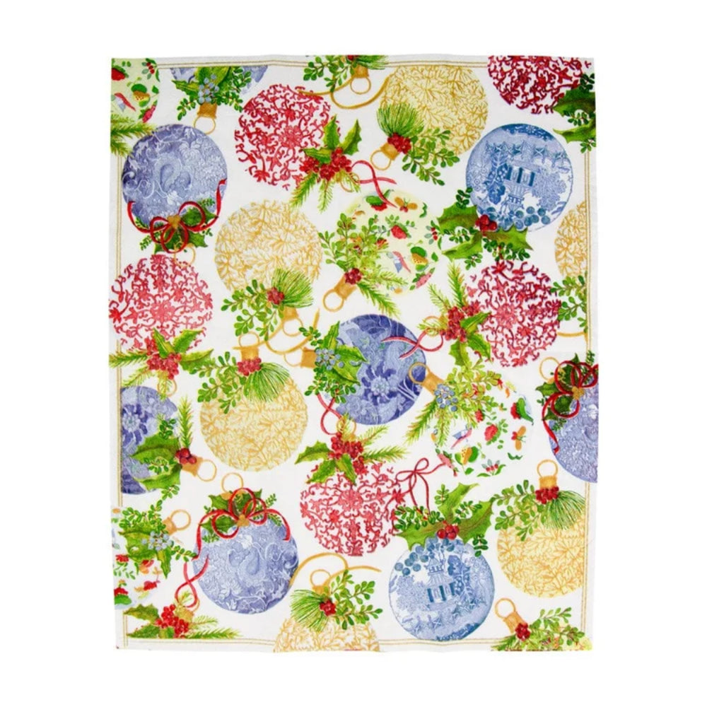 A rectangular towel fabric featuring a festive Christmas design with blue and red ornaments, green holly leaves, pine branches, and red berries on a white background.