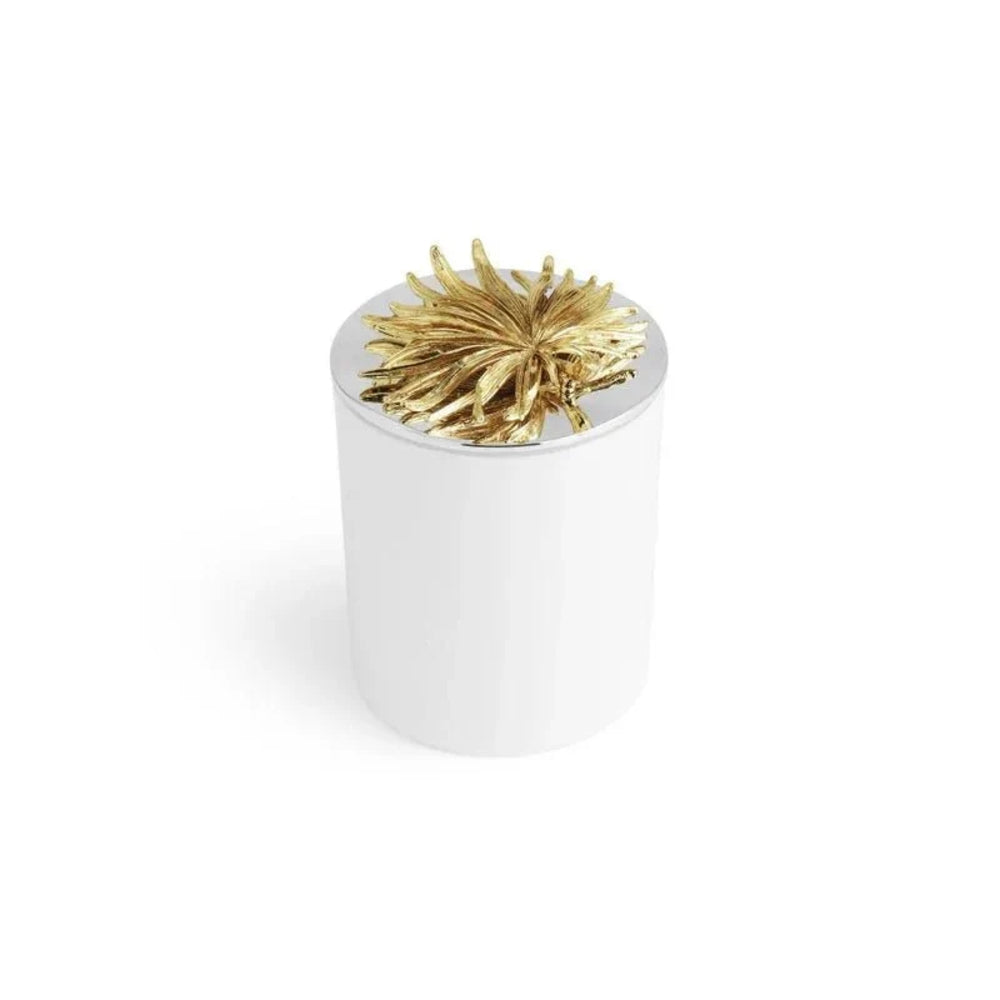 Decorative object with gold leaf design on a white background