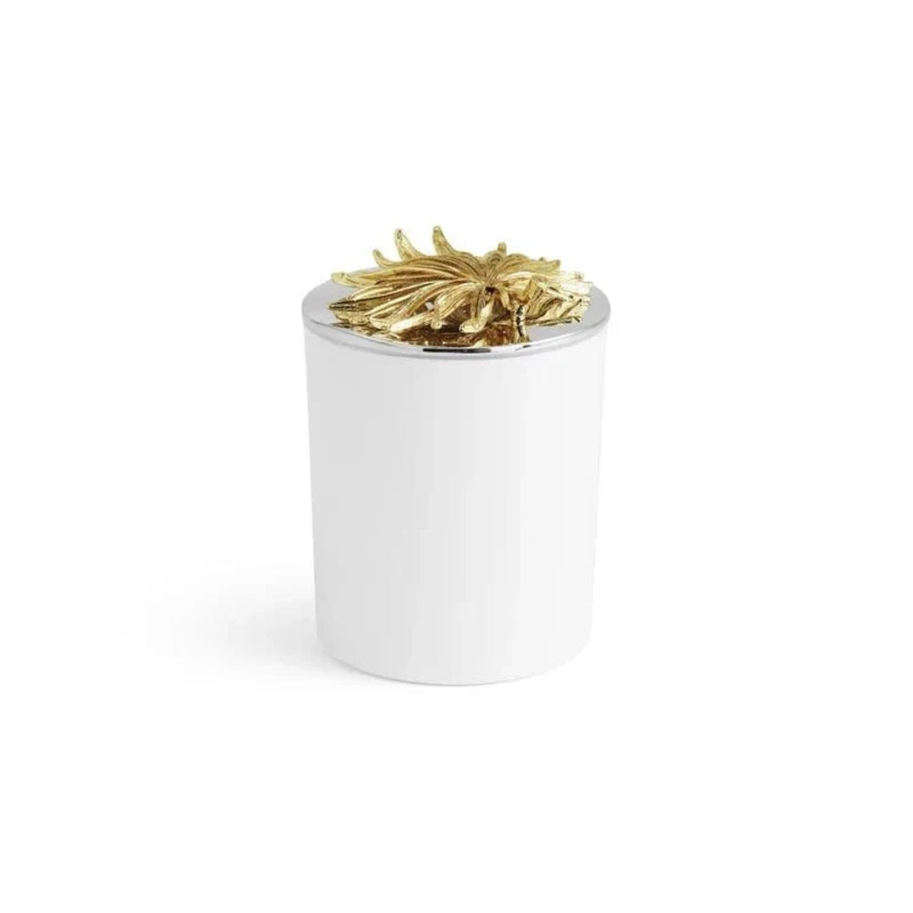 A white cylindrical container with a metallic gold leaf-like lid, shown on a clean white background.