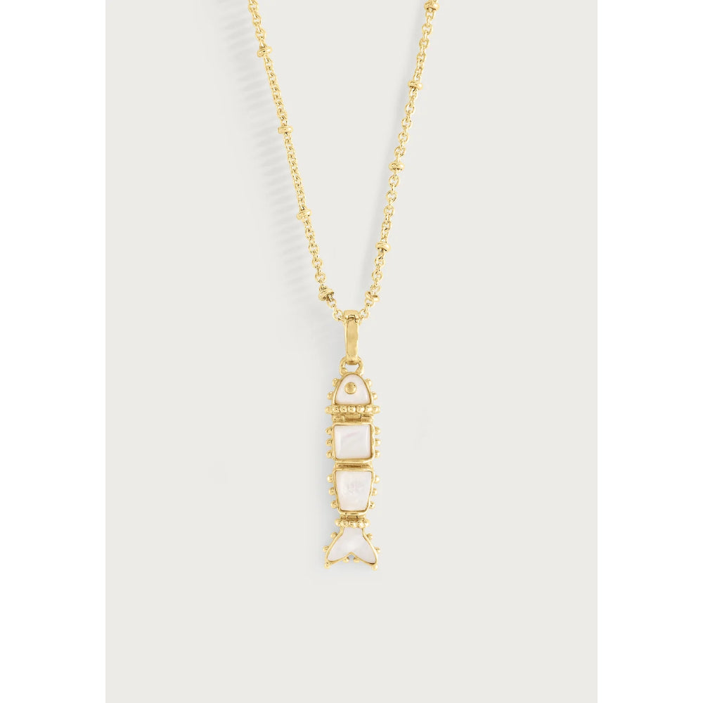 A gold chain necklace with a fish-shaped pendant featuring three pale pinkish-white rectangular inlays, shown against a light gray background.