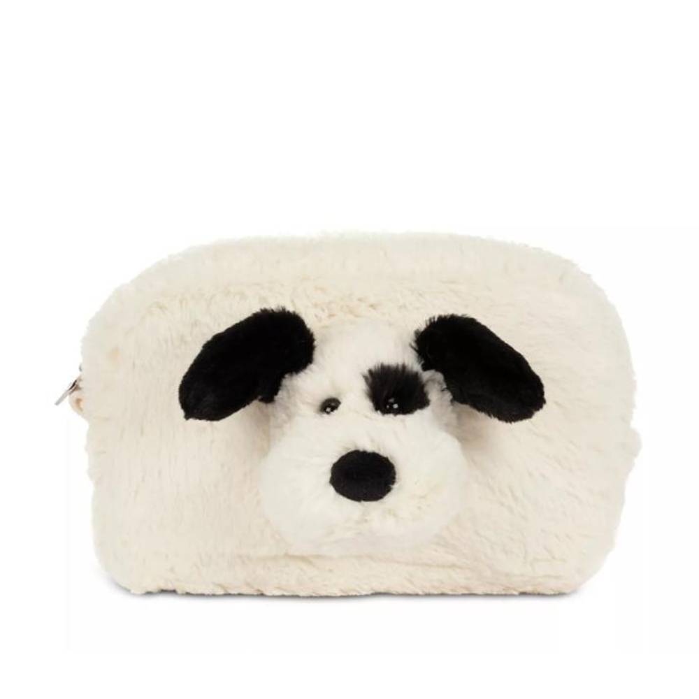 A fluffy faux-fur pouch shaped like a dog face, featuring black ears, nose, and eyes on an off-white background, photographed on a solid white studio background.