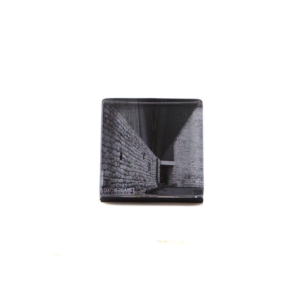 A front facing side photo of the Simon Pearce Woodbury Square Photo Block on a white backround.