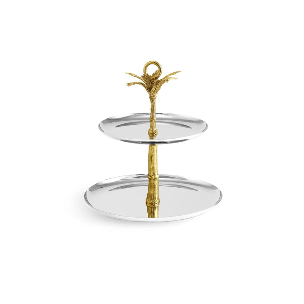 Two-tiered serving tray with gold and silver design on a white background