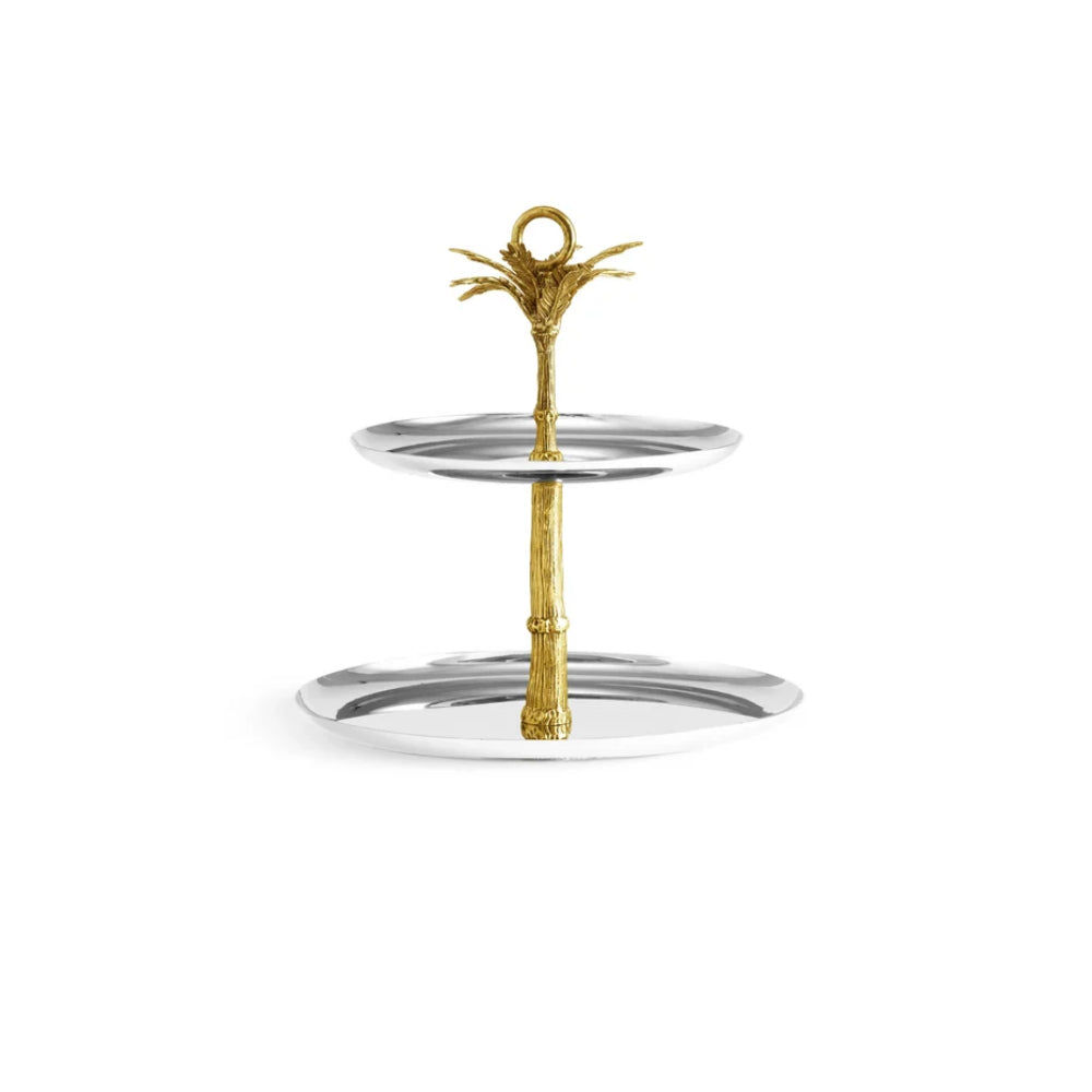 Two-tiered silver and gold serving tray on a white background
