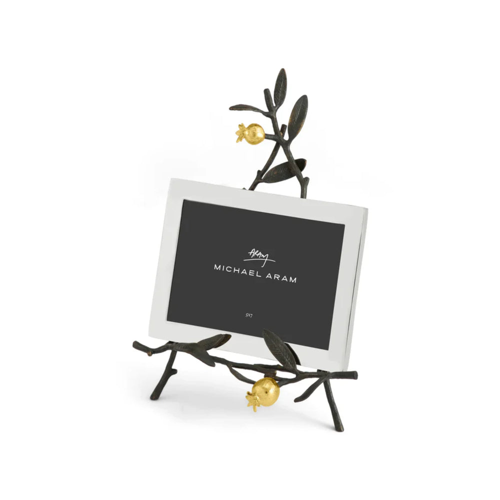 Decorative photo frame with olive branch design on a white background
