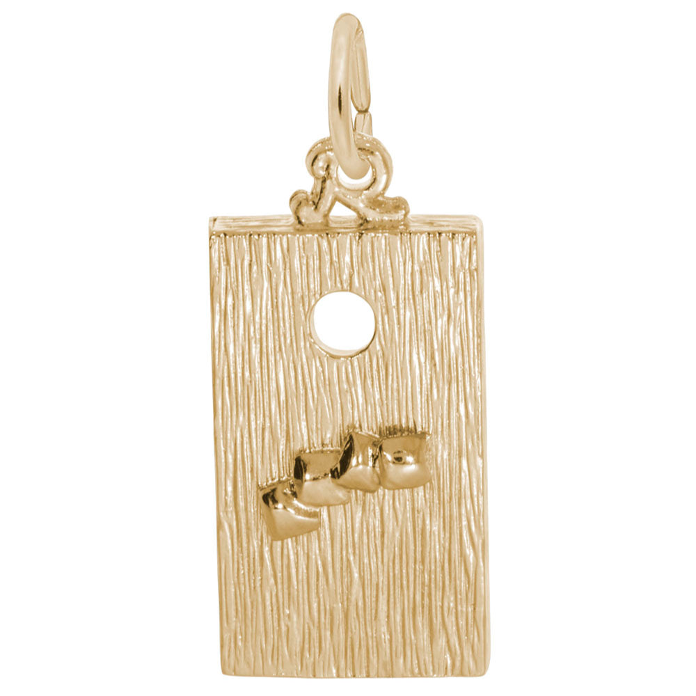 Gold textured corn hole board charm on a white background