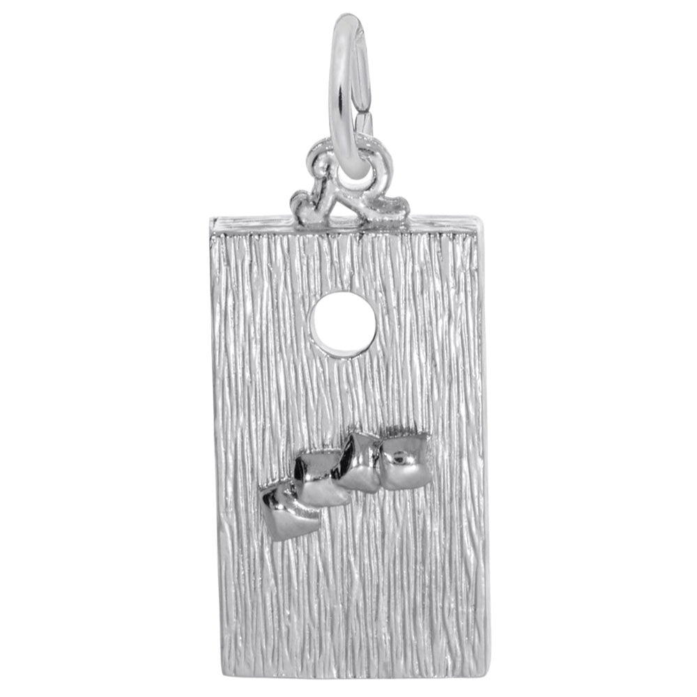 Silver textured corn hole board charm on a white background