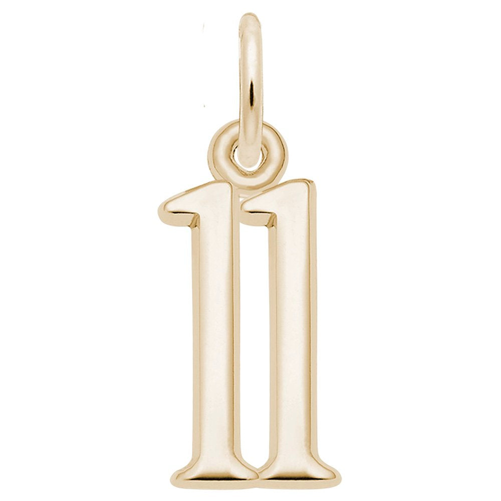 Gold number '11' charm on a white background