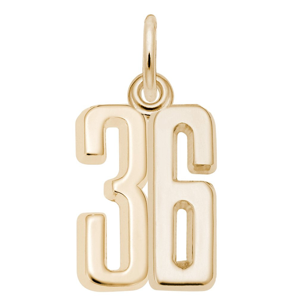 Gold number '36' charm on a white background