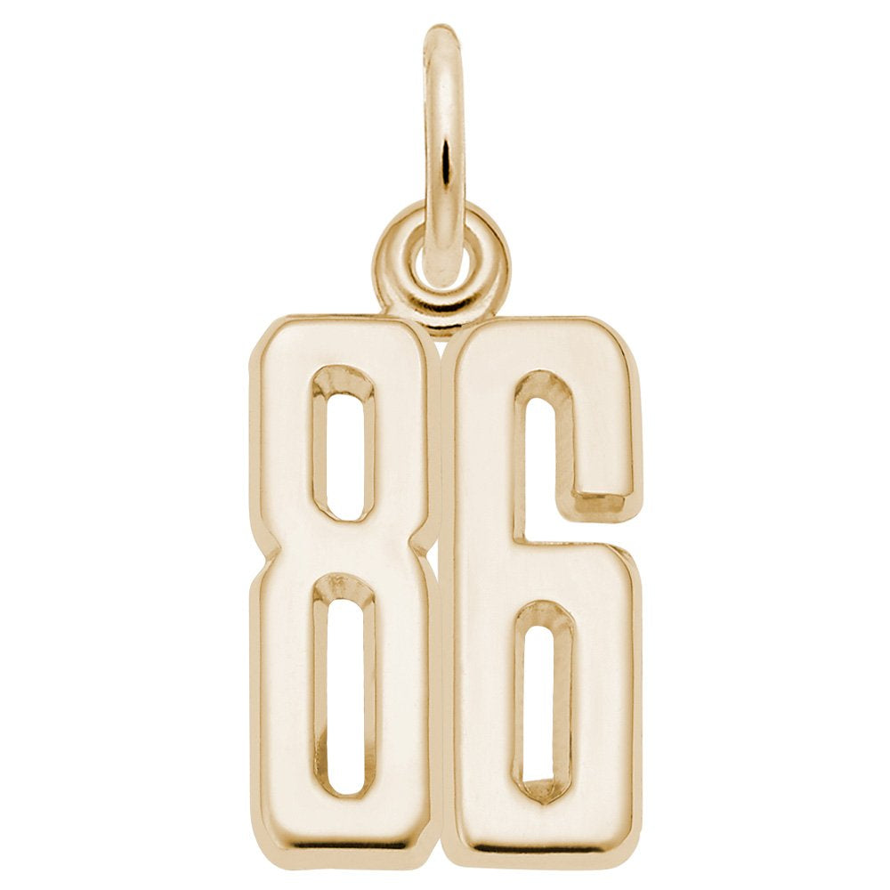 Gold number '86' charm on a white background