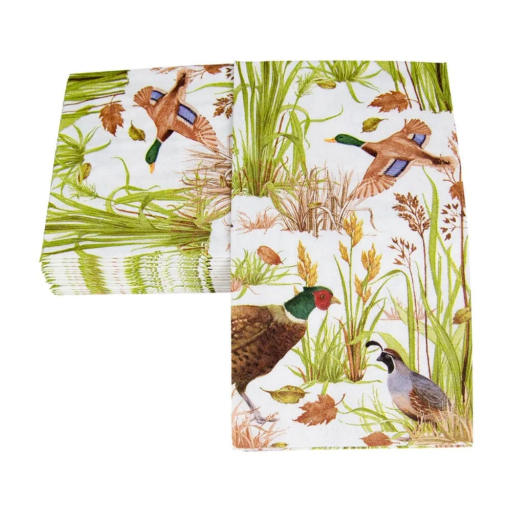 A stack of folded paper guest towels featuring a detailed nature print with mallards, a pheasant, a quail, and reeds on a white background.