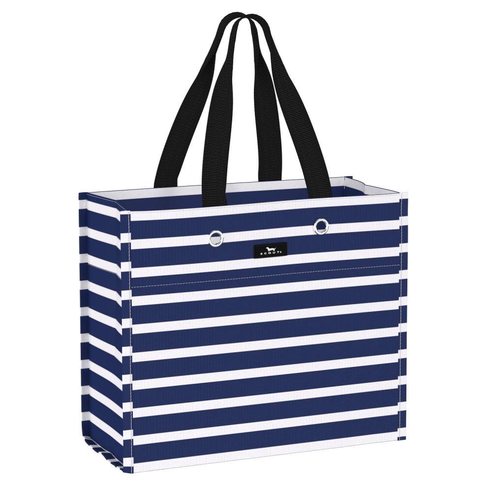A striped canvas tote bag with navy blue and white horizontal stripes, featuring black shoulder straps and a small black brand plaque on the front.