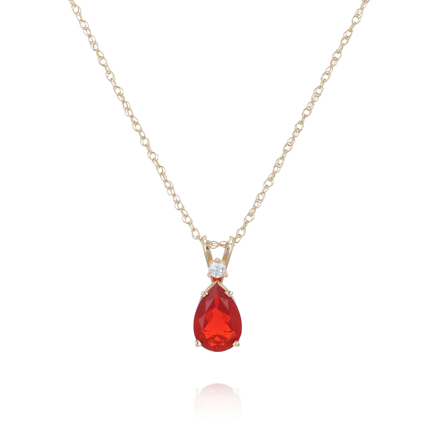 Yellow gold pear shape fire opal and diamond pendant necklace on a white background