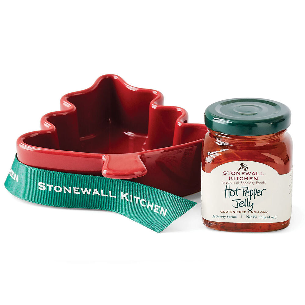 Red tree ramekin with green ribbon and Stonewall Kitchen hot pepper jelly jar on a white background