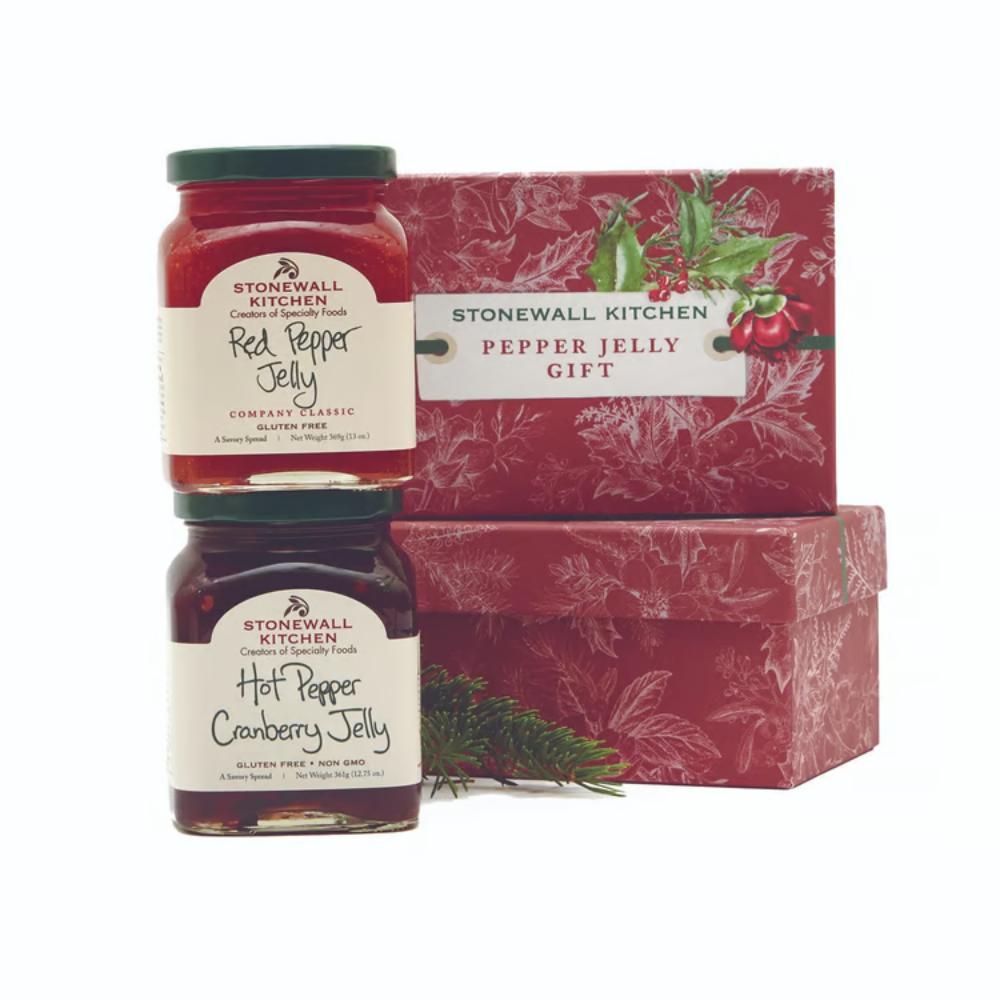 Two jars of Stonewall Kitchen jelly with a decorative box on a white background