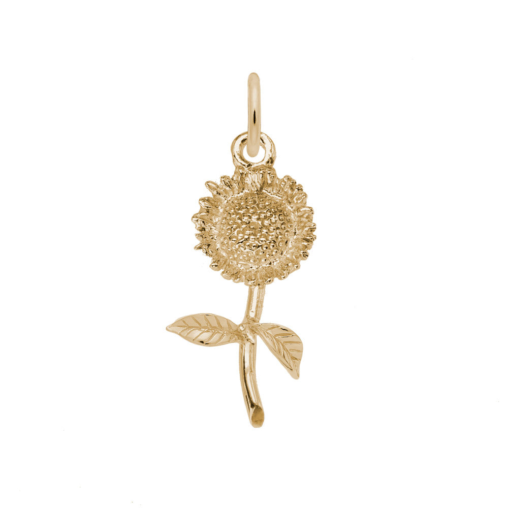A gold charm in the shape of a small sunflower with a stem and two leaves.