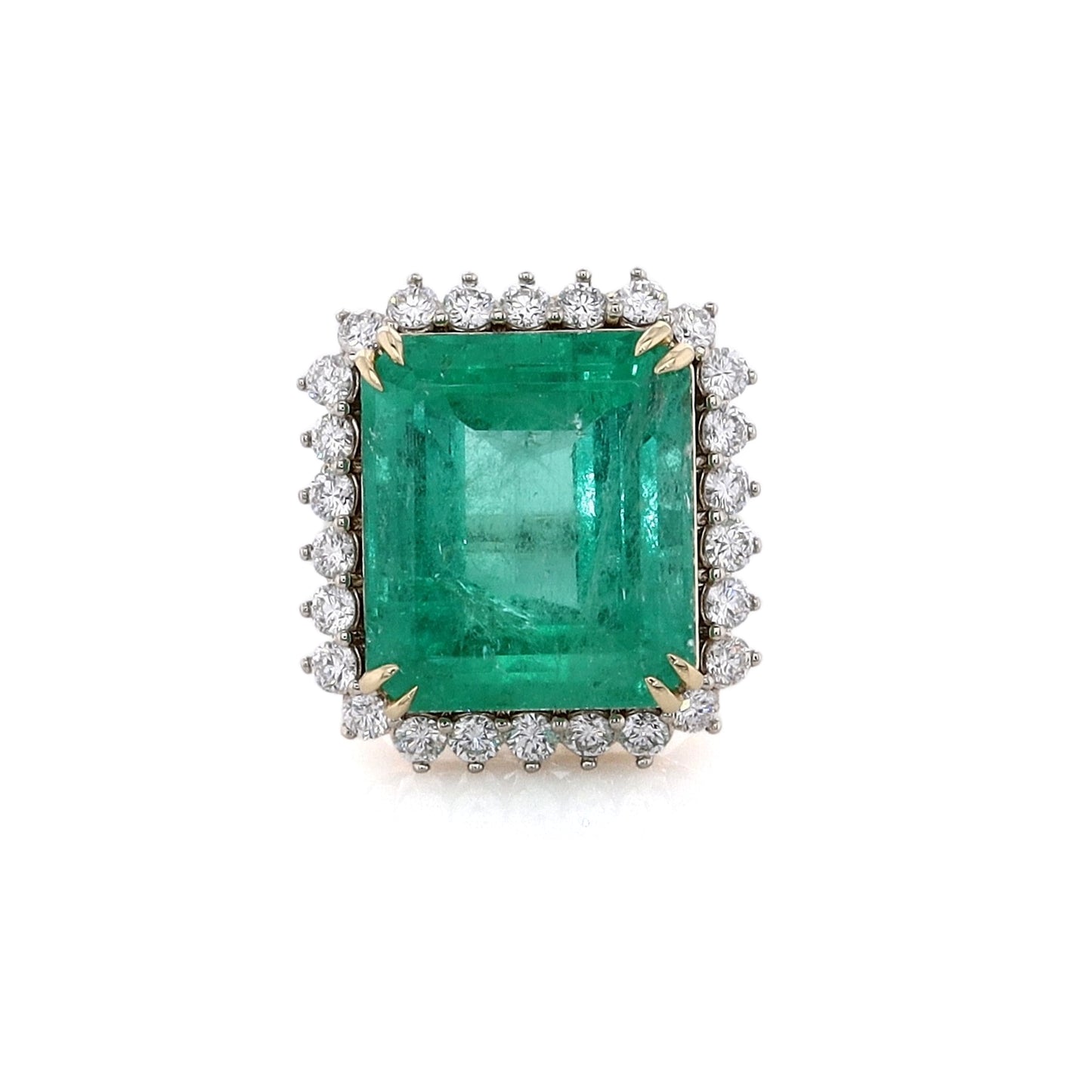 Estate 18 Karat White and Yellow Gold Emerald and Diamond Ring