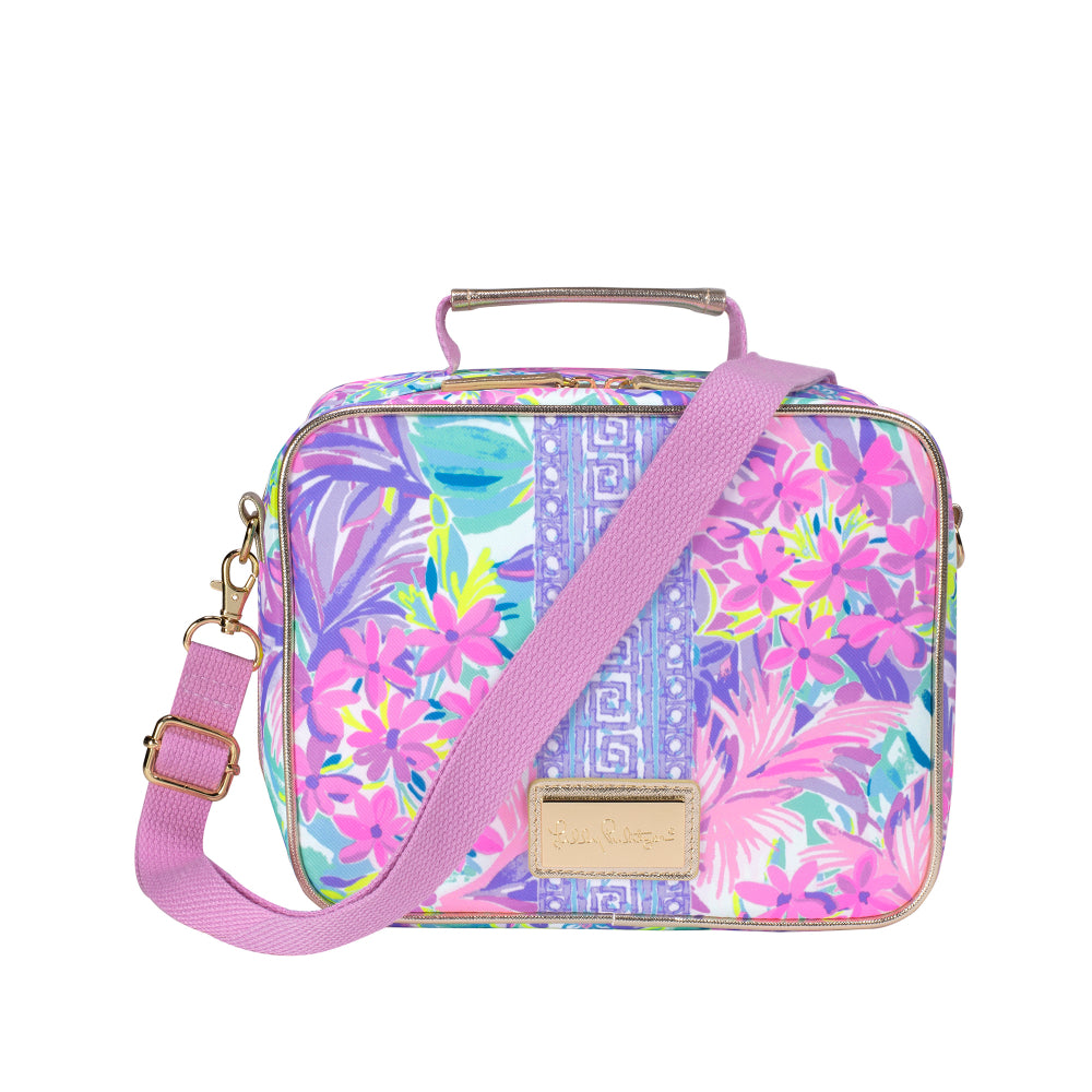 A square cosmetic bag featuring a colorful tropical floral print in pink, purple, and blue, with a light pink shoulder strap and a gold-tone handle, on a white background.