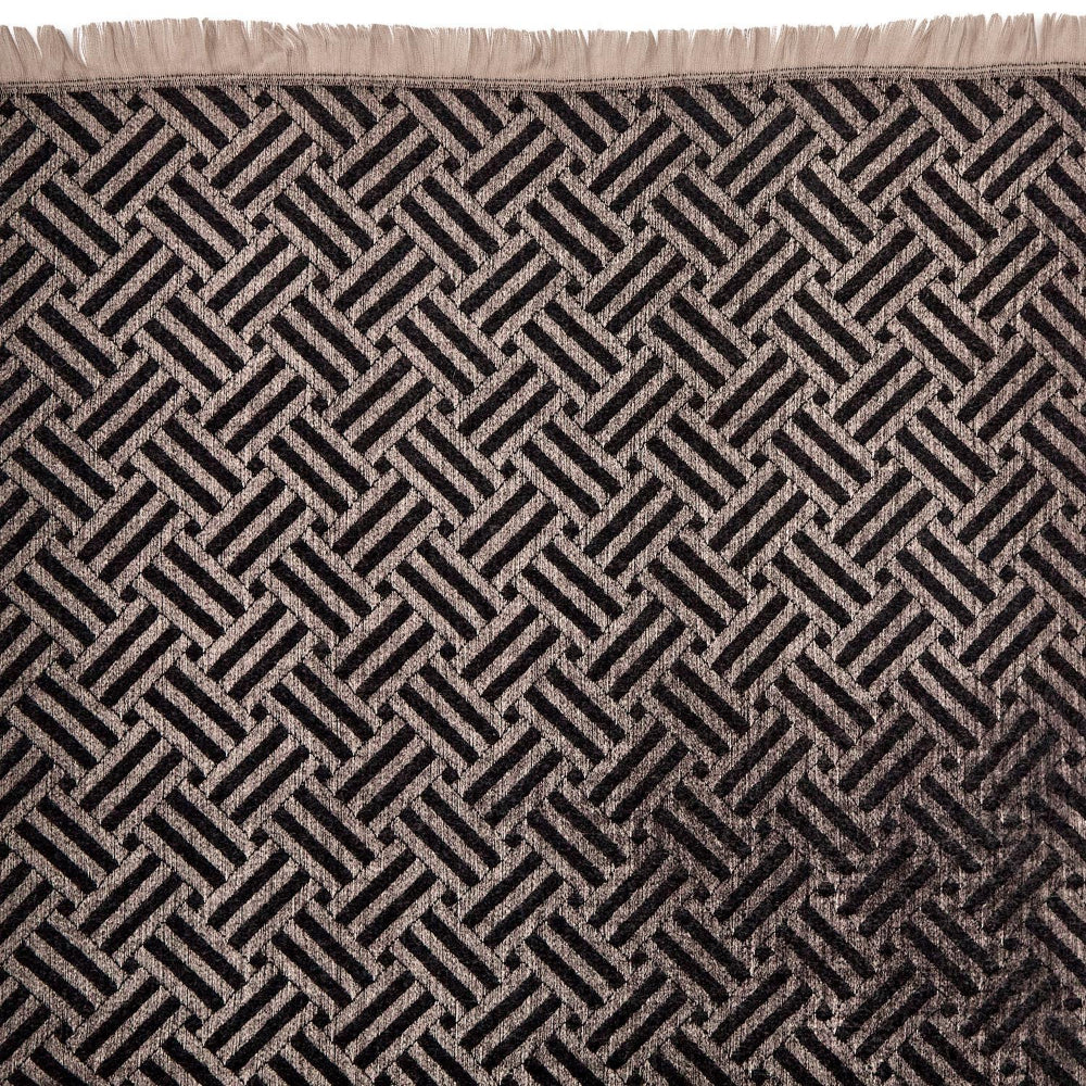 Close-up of a black & beige patterned scarf in a geometric design 