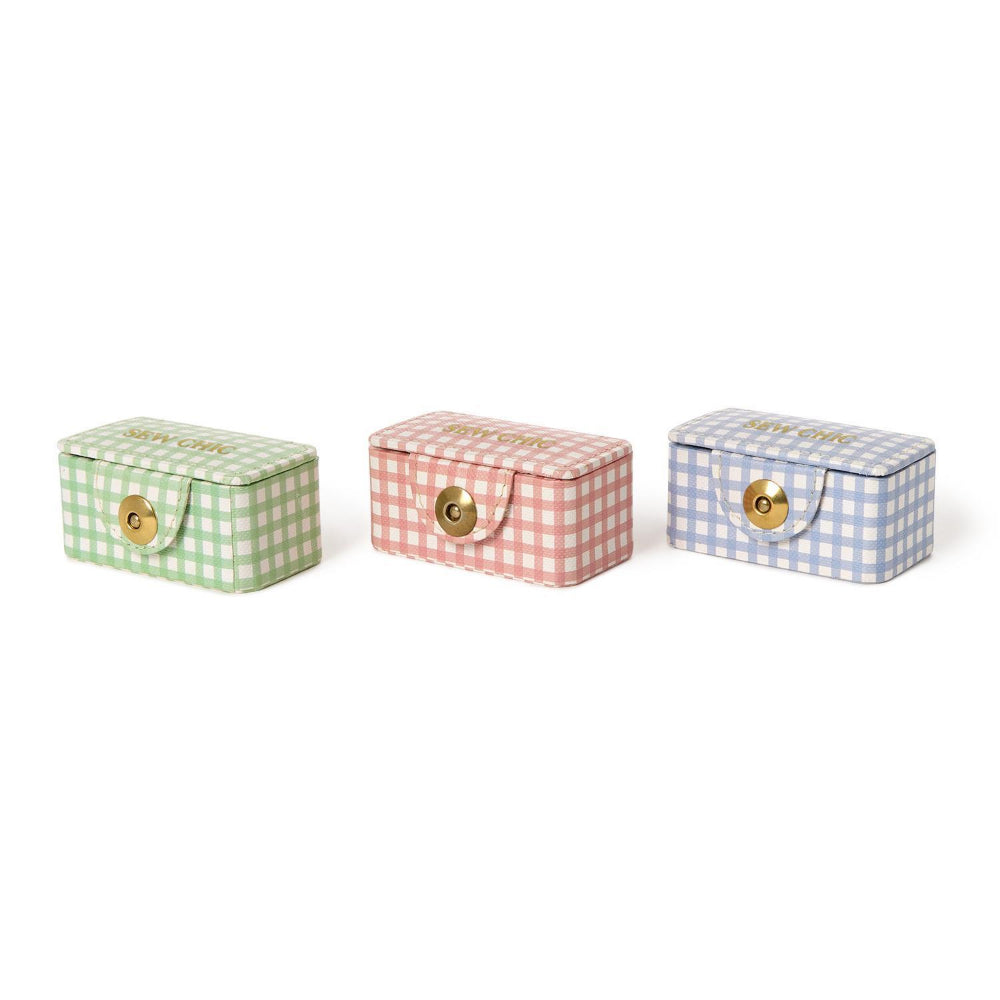 Three small sewing kit boxes with gingham patterns in blue, red & green on a white background.