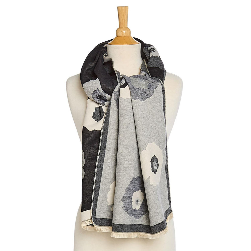 Scarf with grey multi floral pattern on a mannequin against a white background.