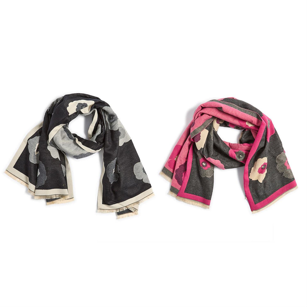Two scarves, one black and white patterned and one pink and gray patterned, on a white background.