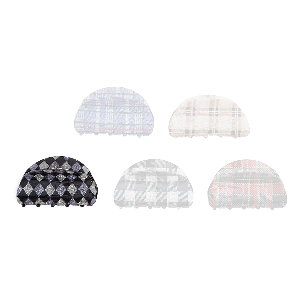 Black dimond plaid colored hair clip on a white background