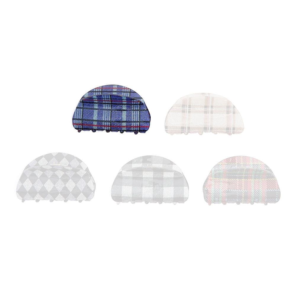 Blue plaid colored hair clip on a white background