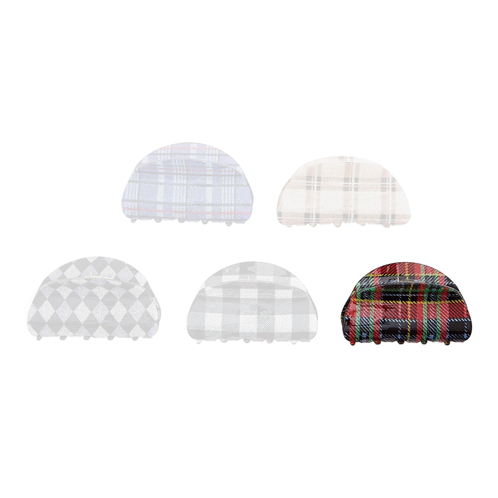 Red plaid colored hair clip on a white background