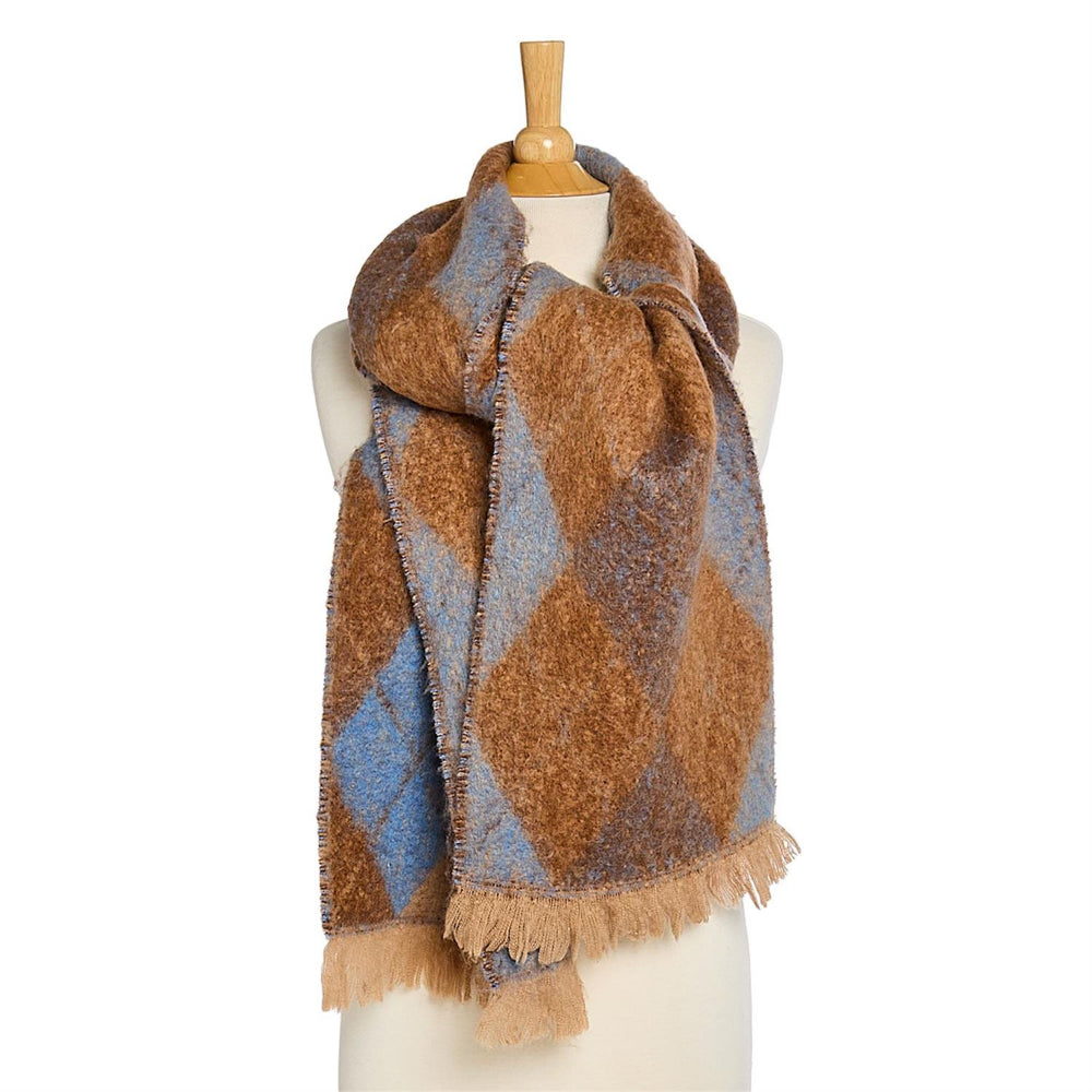 Tan & blue patterned scarf with tan fringe edge on a mannequin with a white background