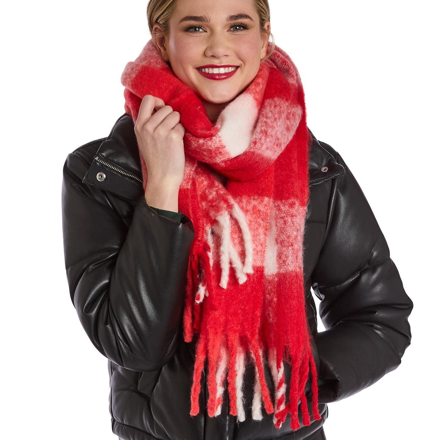 Woman wearing a red plaid scarf and black leather jacket on a white background