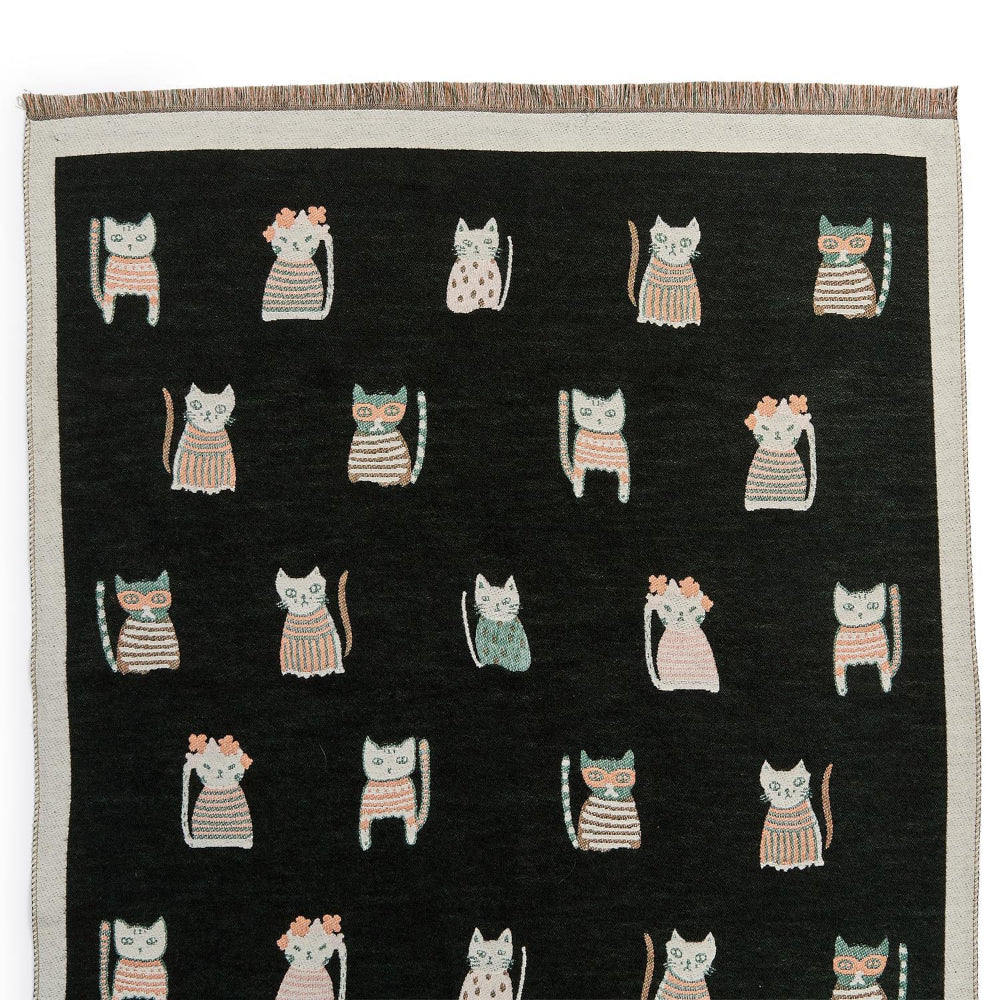 Black scarf with a cat print showing the design on a white backround.