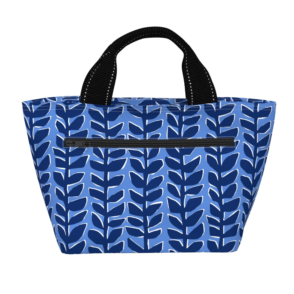 Blue patterned lunch bag with black handles on a white background