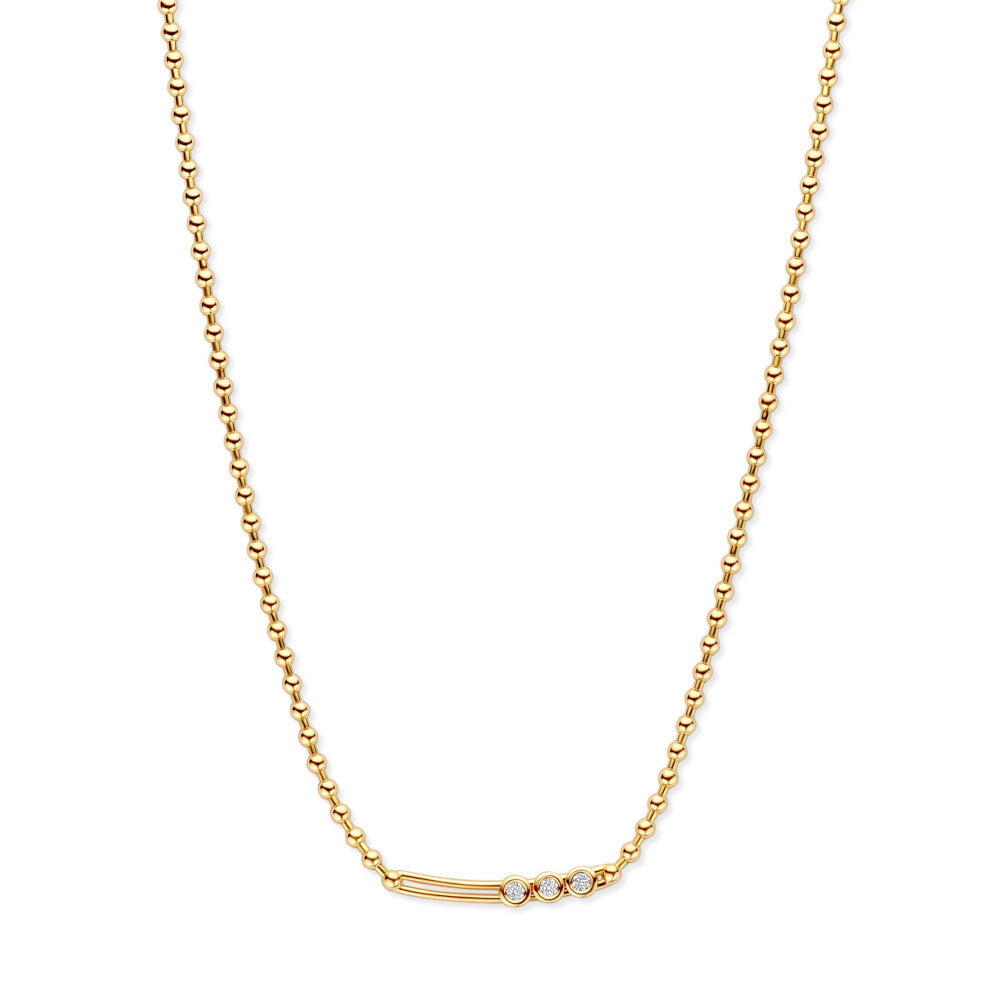 Gold necklace with a subtle design on a white background