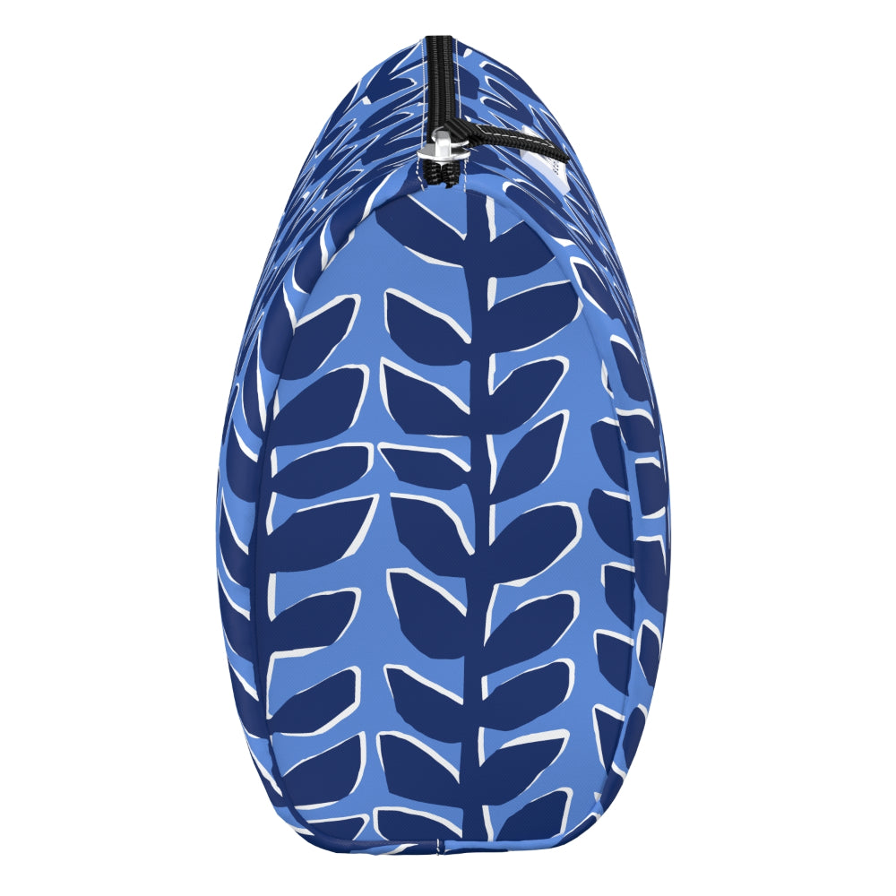 Blue patterned toiletry pouch with a zipper on a white background