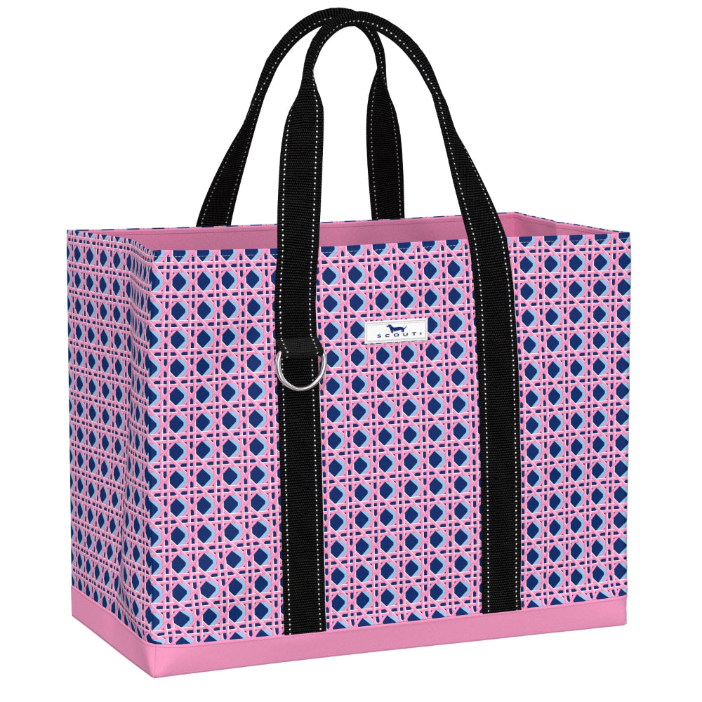 Pink and blue patterned tote bag with black handles on a white background