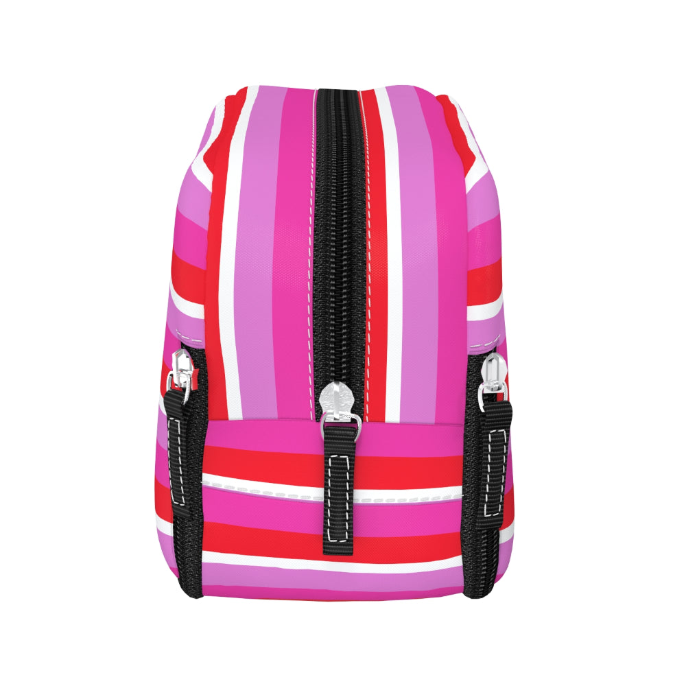 A small makeup bag with a bold vertical stripe pattern in shades of pink, red, and white, featuring black zippers and silver metal hardware, shown against a plain white background.