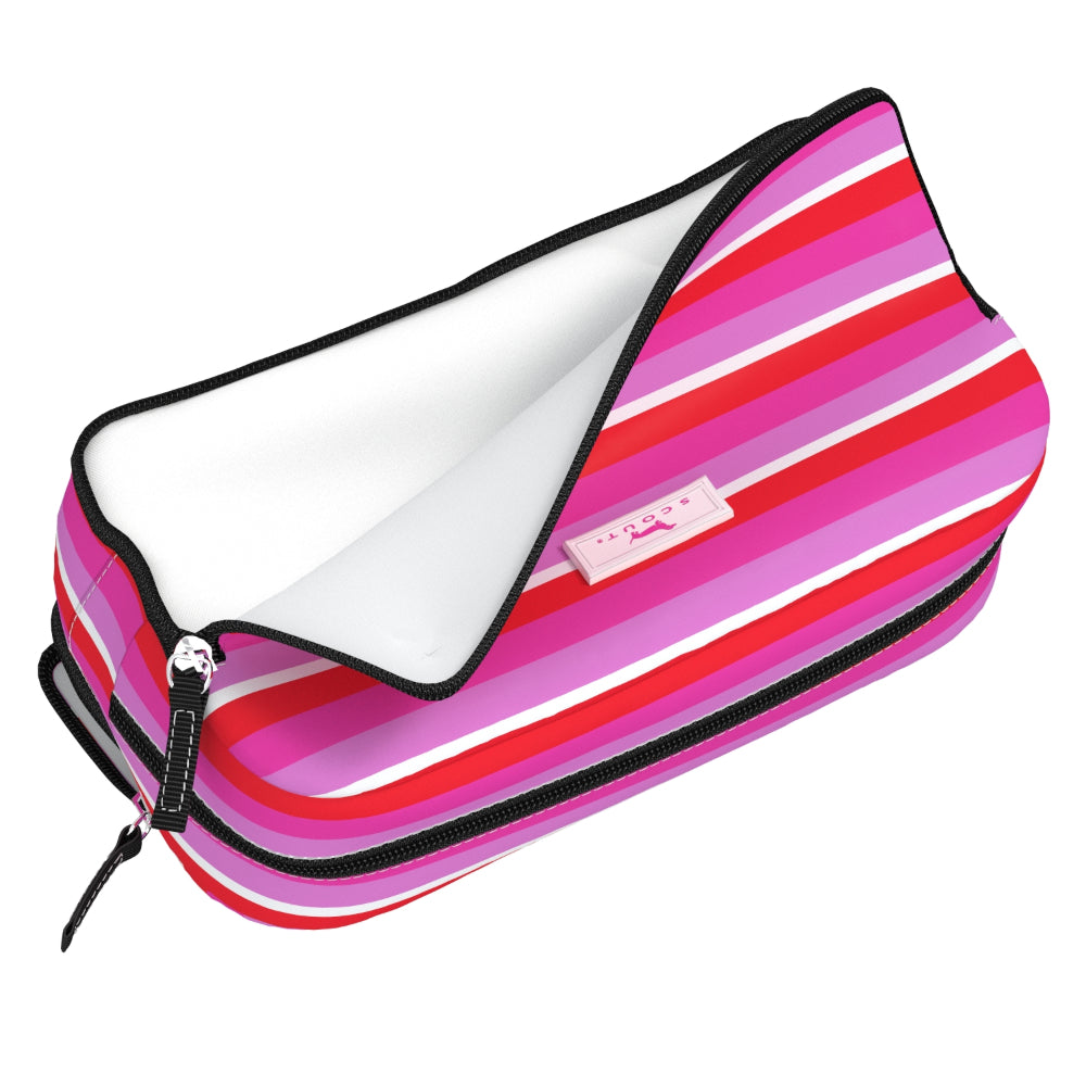 A zippered storage pouch with a vibrant pink, red, and white striped pattern, shown open to reveal a white interior lining.