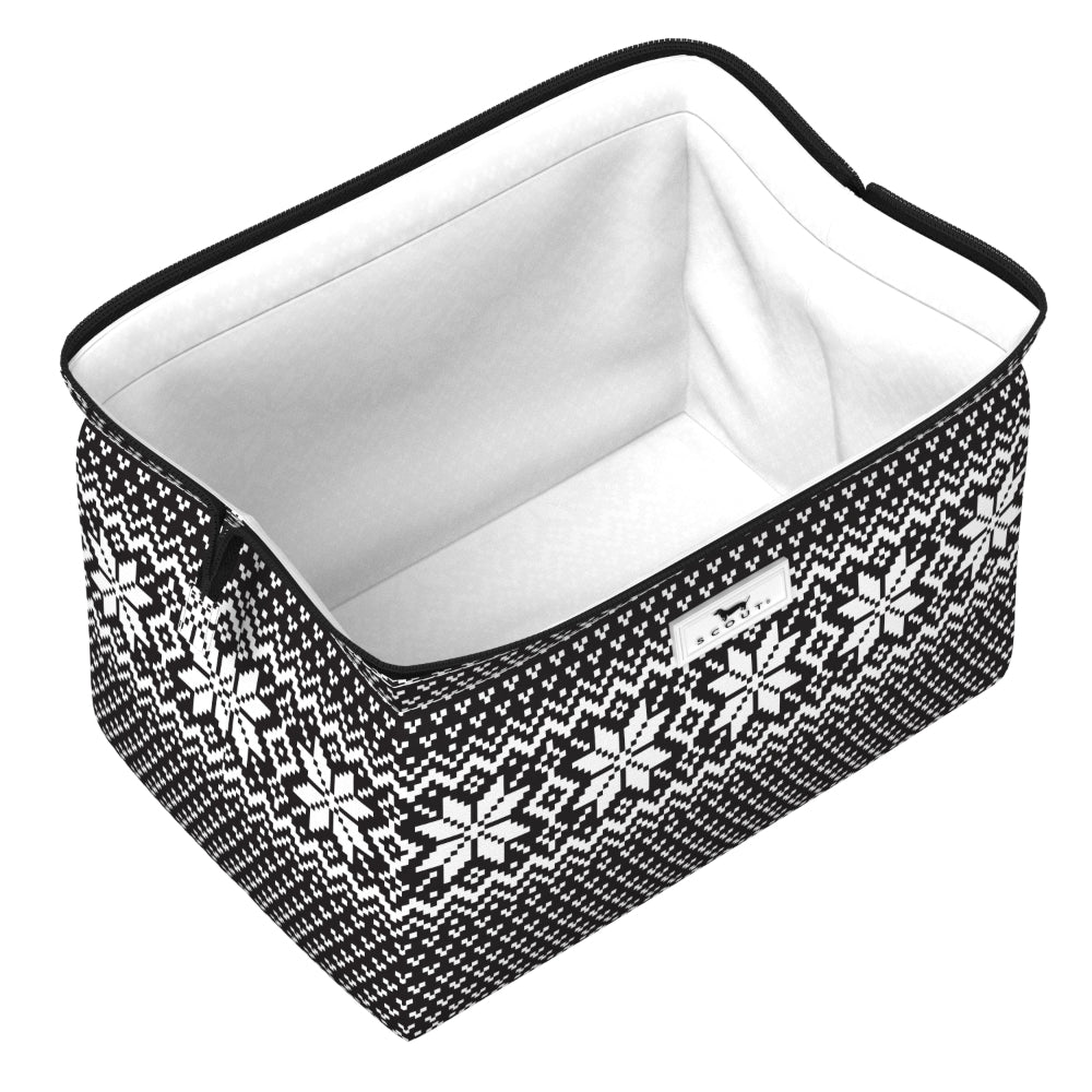 A rectangular zippered storage bin with a black and white Nordic snowflake knit pattern on the exterior and a white interior lining, shown on a plain white background.