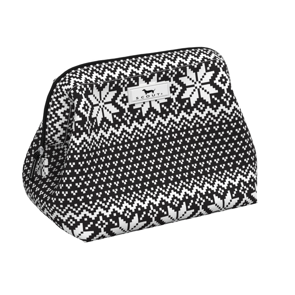 A black and white patterned cosmetic pouch with a Fair Isle snowflake and geometric design, featuring a white brand label for 'Scout's' with a dog logo.