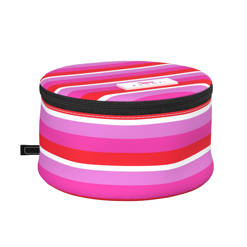 A round zippered jewelry case with a vibrant horizontal striped pattern in shades of pink, red, and white, featuring a black zipper and a small white brand label on the front.