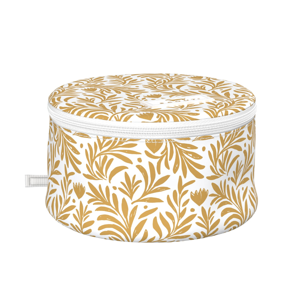 Round jewelry case with gold leaf pattern on a white background