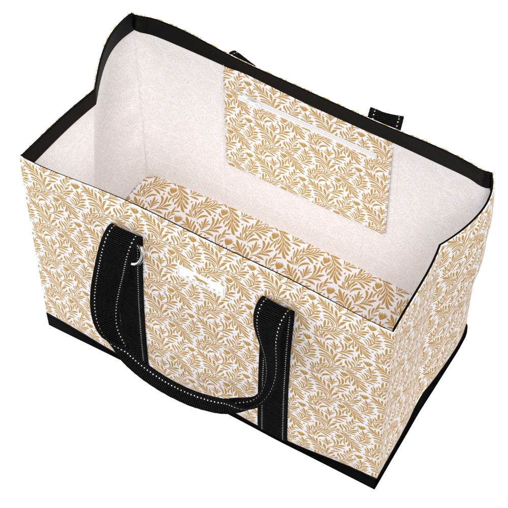 A rectangular storage tote bag with a beige and white botanical leaf pattern, black trim, and black handles, shown open against a white background.