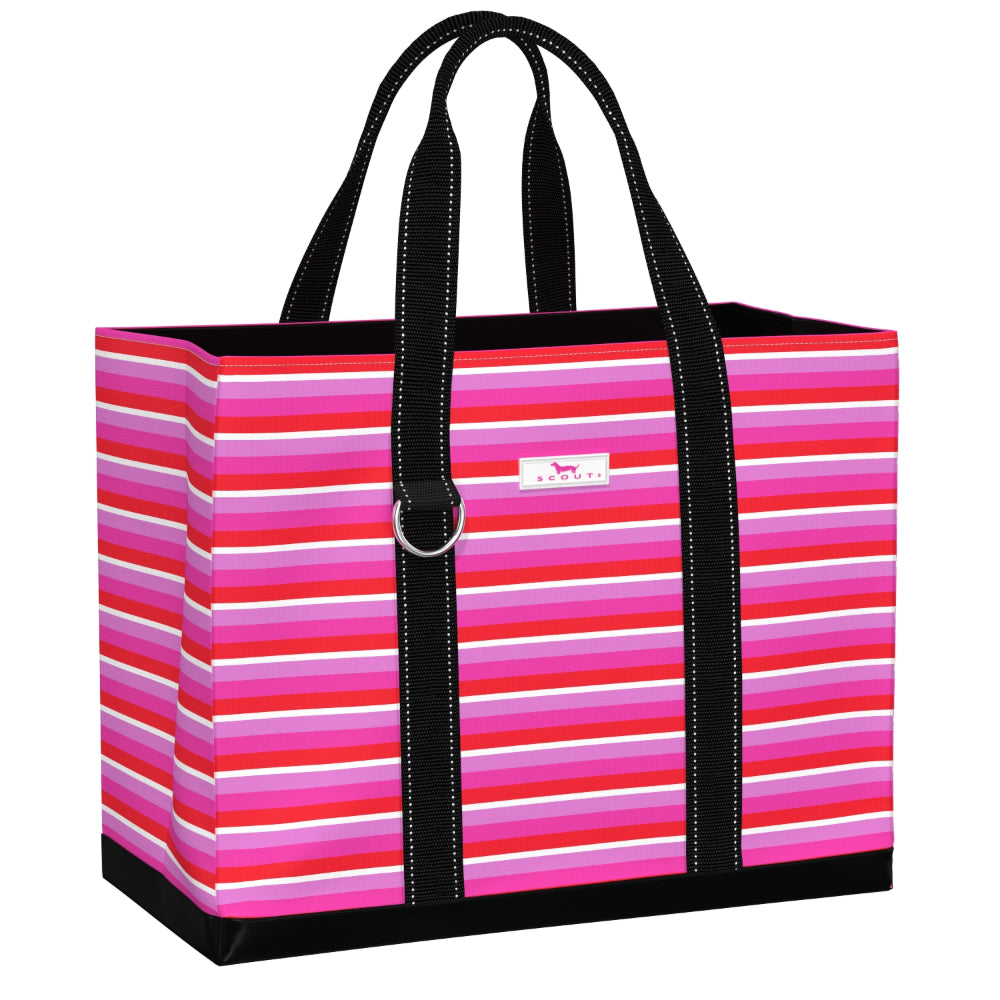 A striped tote bag with horizontal pink, magenta, red, and white stripes, featuring black handles and trim with white stitching, and a small white brand label on the front.