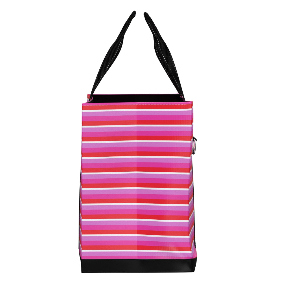 A tote bag with a vibrant horizontal striped pattern in shades of pink, red, orange, and white, featuring black shoulder straps and a black base, shown against a plain white background.