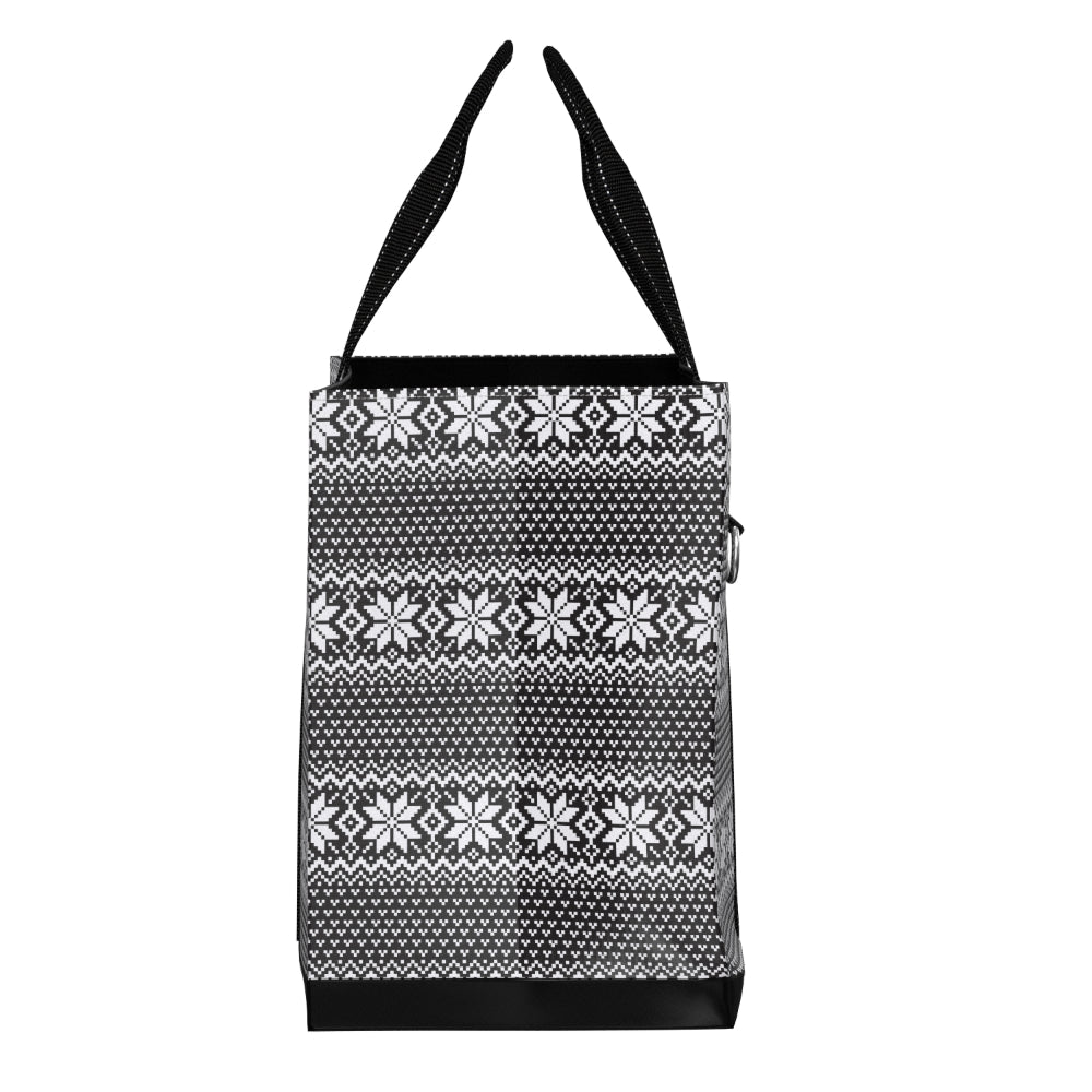 A black and white patterned tote bag with a Nordic fair isle snowflake design and black shoulder straps, shown against a plain white background.