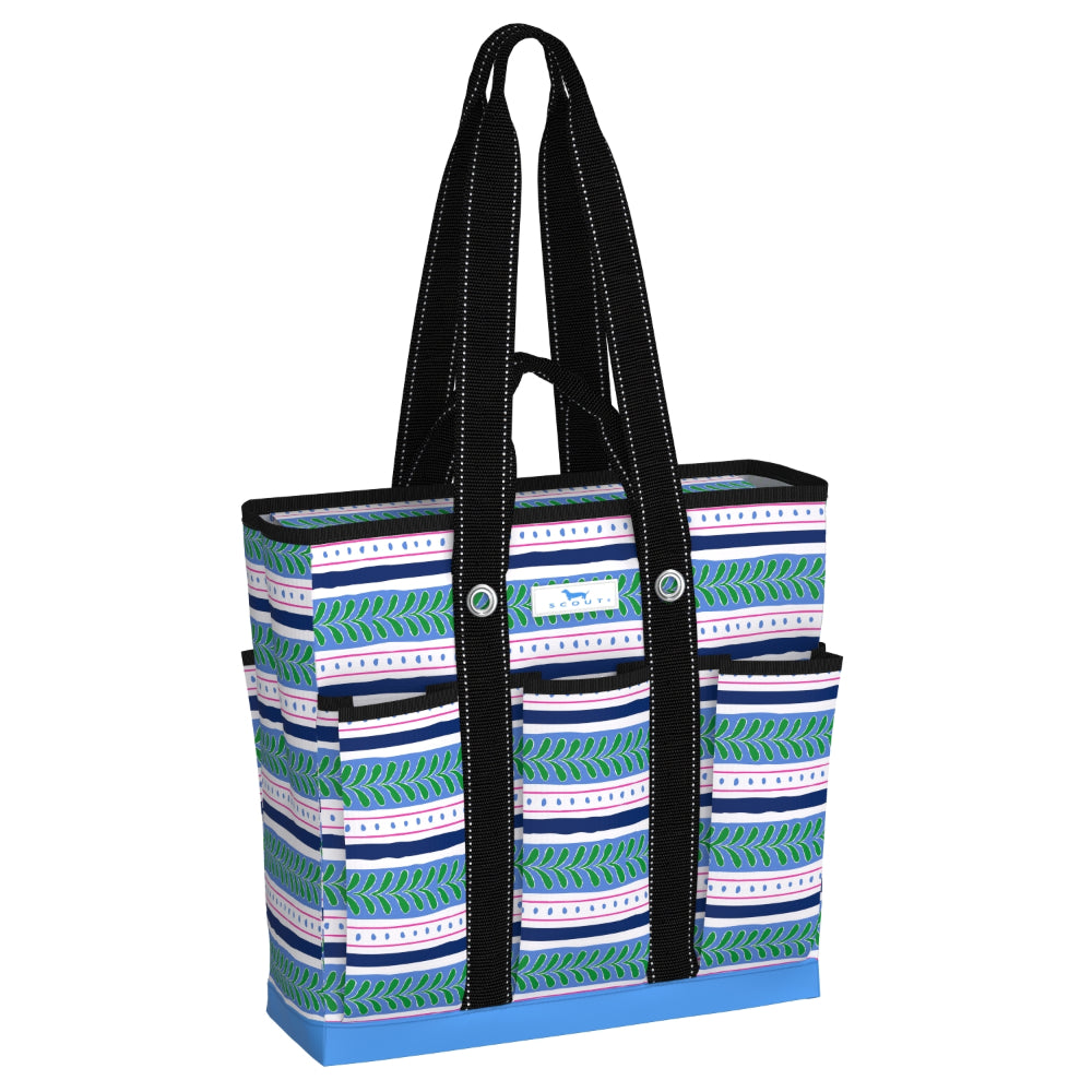 A tote bag with a colorful geometric pattern in teal, navy, white, and pink, featuring black shoulder straps with white stitching and a blue base, shown on a plain white background.