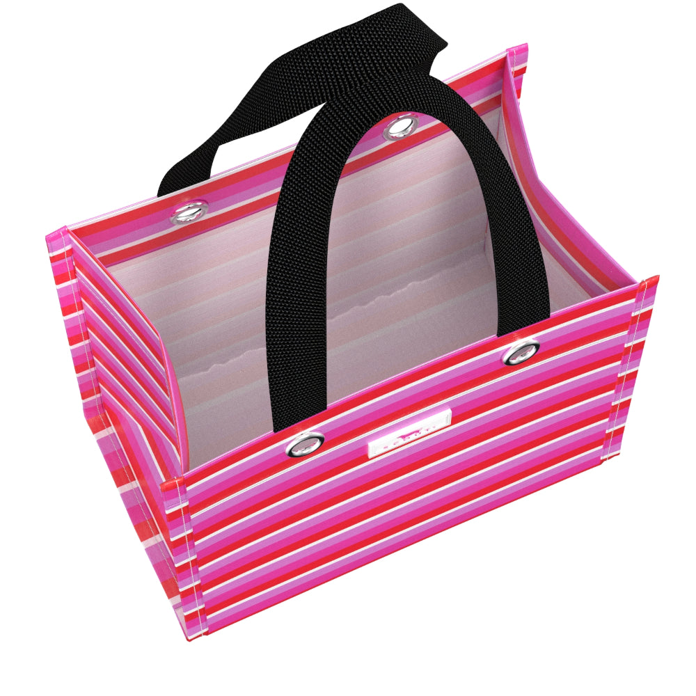 Pink gift bag with black handle on a white background