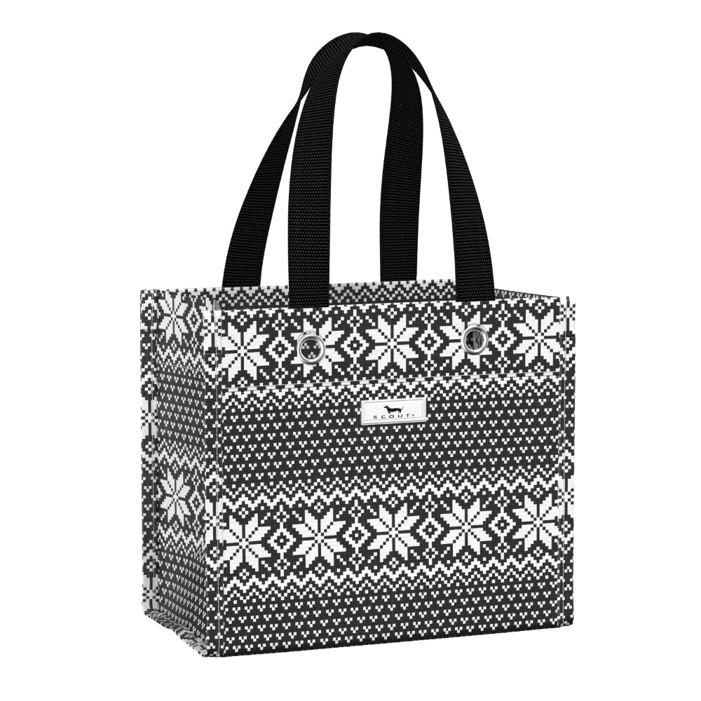 A black and white patterned tote bag with black webbed handles, featuring a Nordic fair isle snowflake design and a small white brand patch on the front.