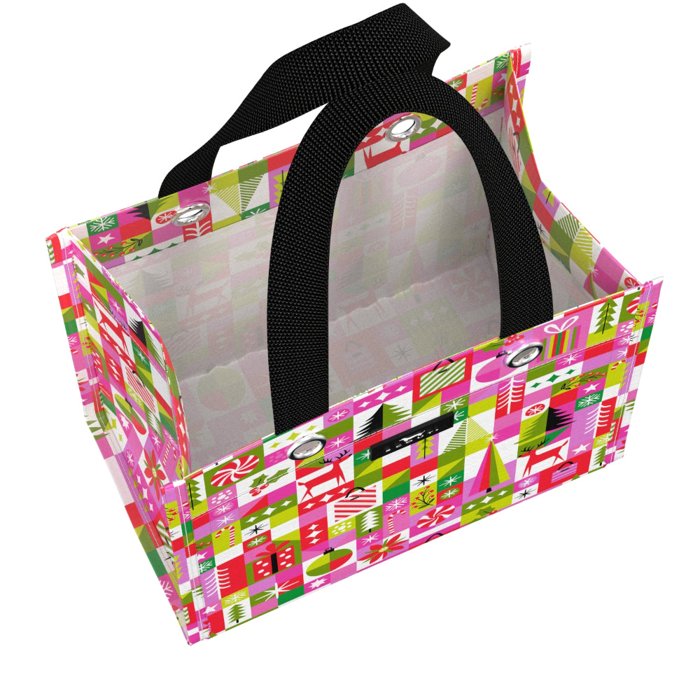 A rectangular gift bag with a colorful geometric patterned exterior, a light pink interior, and two black shoulder straps, shown on a plain white background.